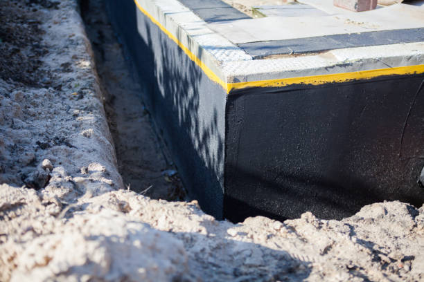 Professional Emergency Waterproofing technician working in Hartford, WI